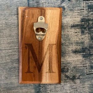 “M” wall decor with beer bottle opener